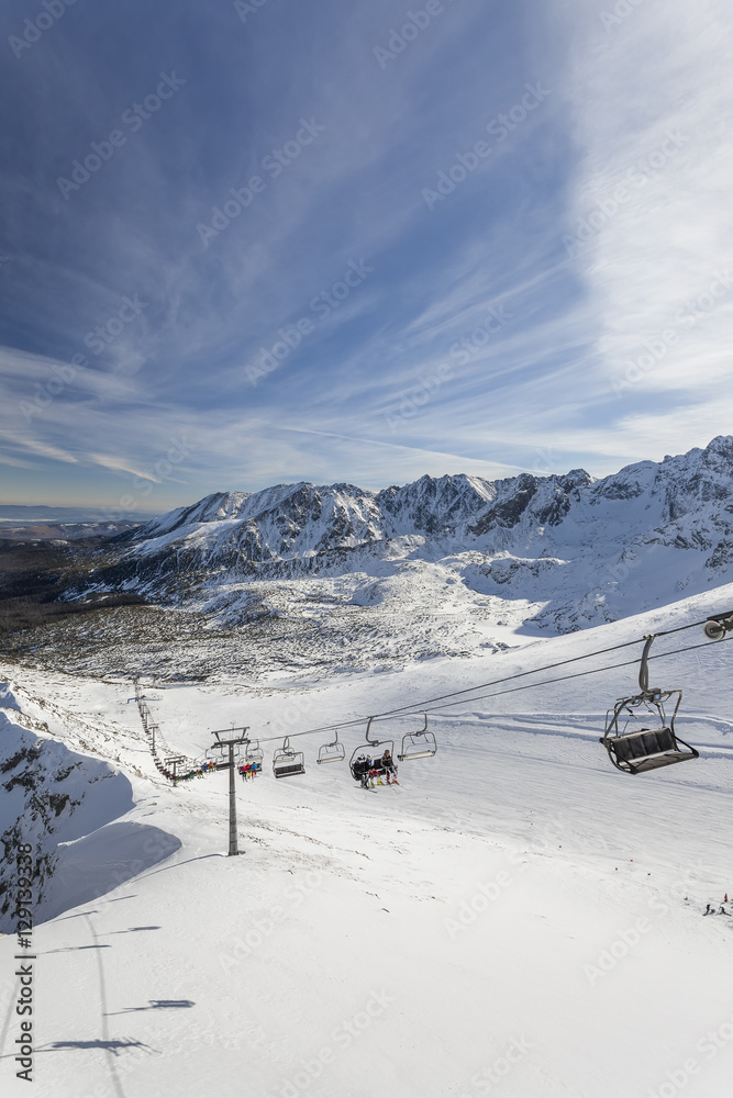 Fototapeta premium Chairlift in the high mountains