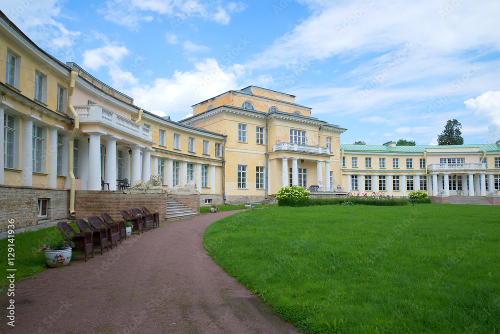 Central part of an ancient noble mansion in the cloudy July afternoon. Leningrad region