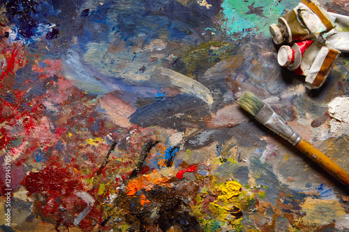Fototapeta Naklejka Na Ścianę i Meble -  Oil paints and paint brushes on a palette.
