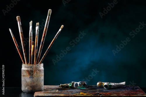 Paint brushes with a palette. photo