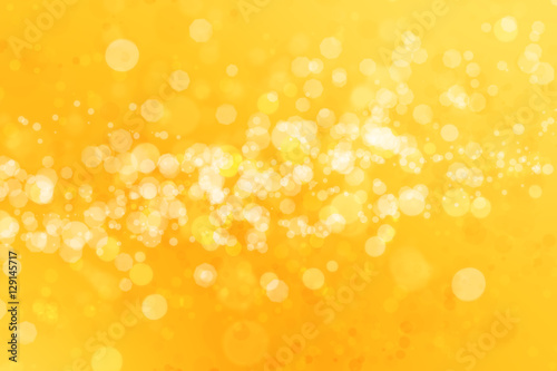 Abstract yellow bokeh background.