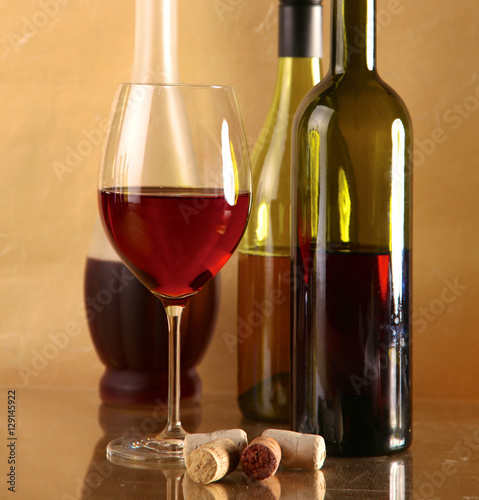 wine bottle and  glass on a  table