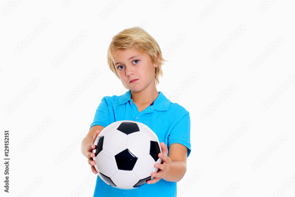 boy with soccer ball is not happy