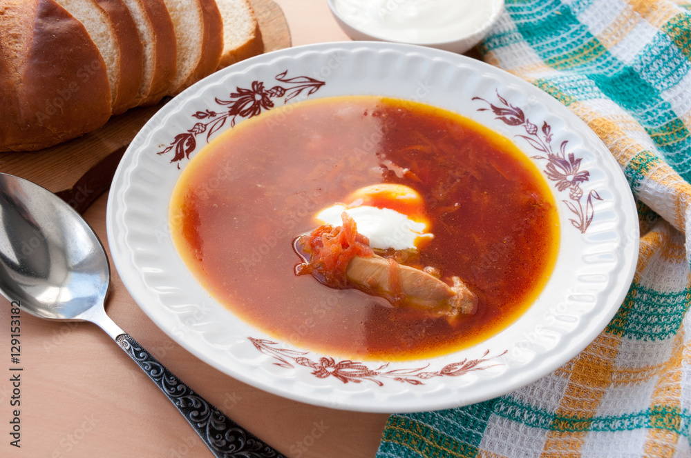 Plate of delicious soup from beet with sour cream and chicken Plate of delicious soup from beet with sour cream and chicken