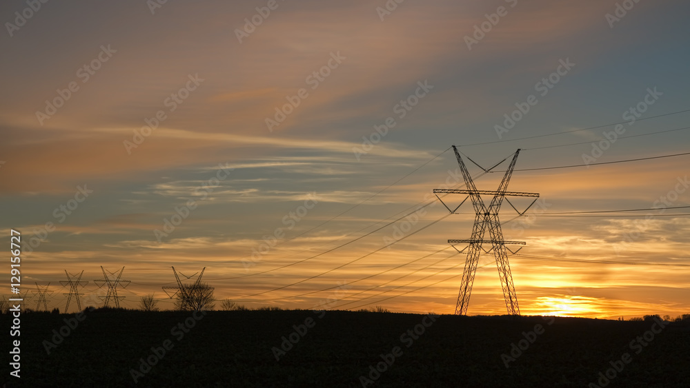 Power Pylons Against the Sunset