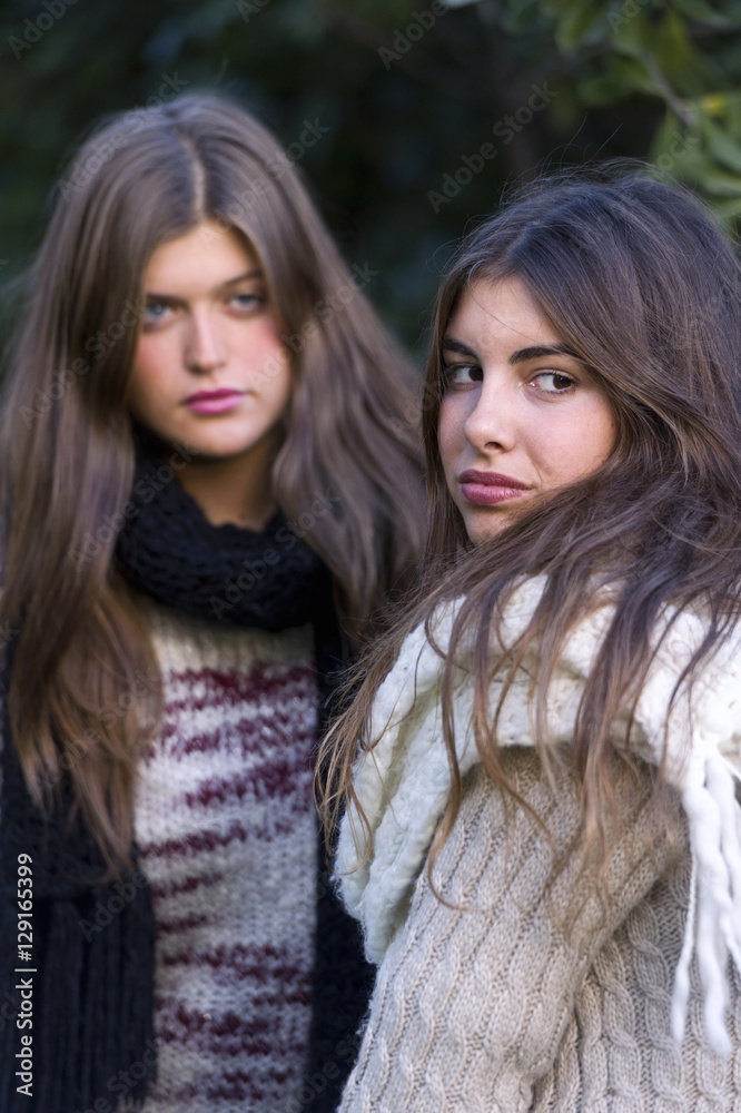 Obraz premium Portrait of two friends with serious face