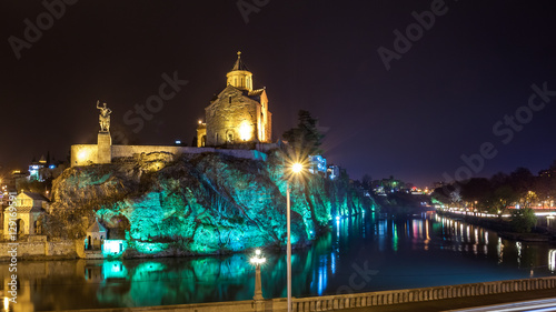 Night Evening Illuminated View Of The Metekhi Church And The Equ