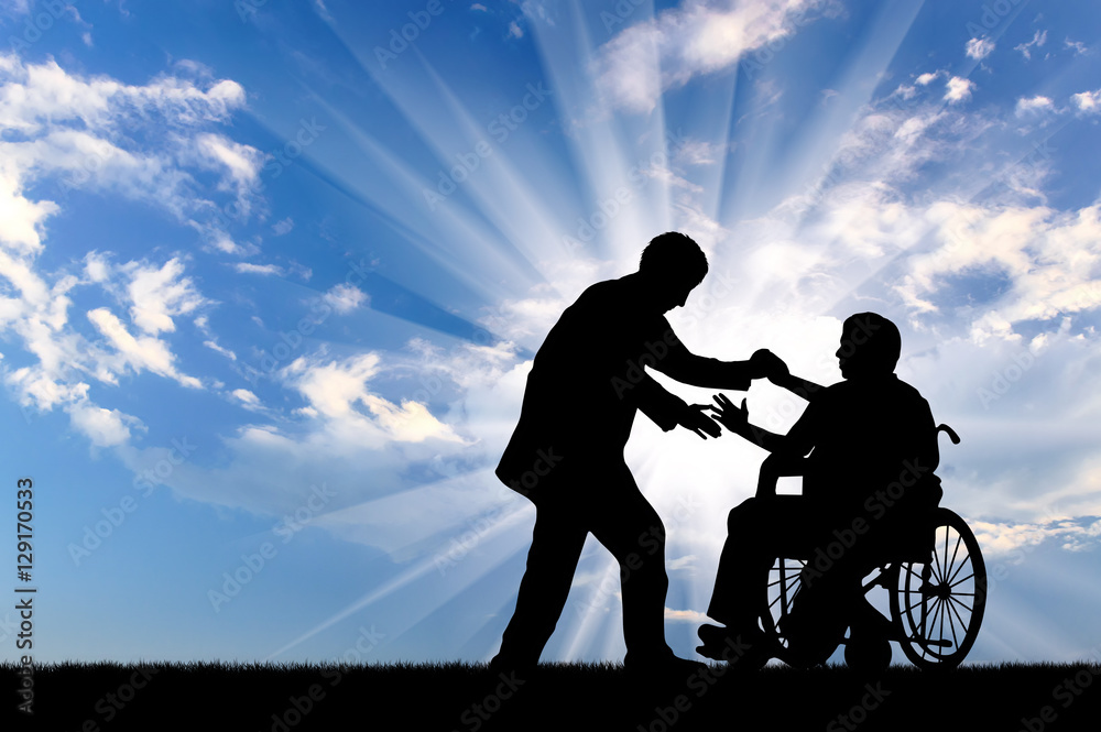 Disabled person in wheelchair get help day Disabled person in wheelchair get help day