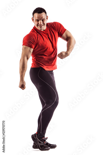 Sexy athletic man showing muscular body, isolated over white background.