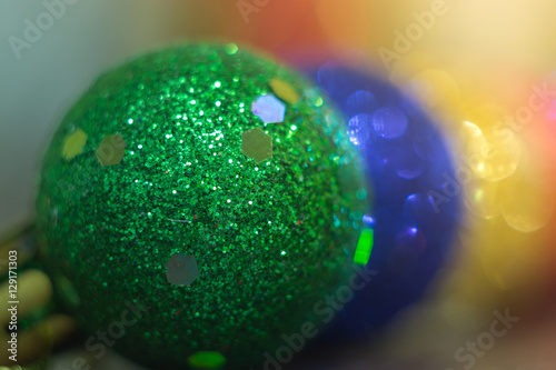 colored Christmas balls with blurred background