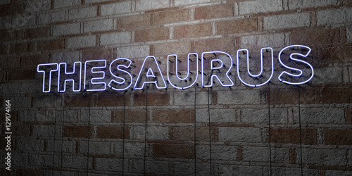 THESAURUS - Glowing Neon Sign on stonework wall - 3D rendered royalty free stock illustration.  Can be used for online banner ads and direct mailers.. photo