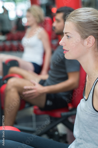 woman training legs in gym
