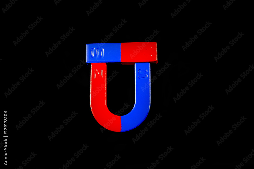 Magnetic red and blue on a black background. Magnetic red and blue on a black background.