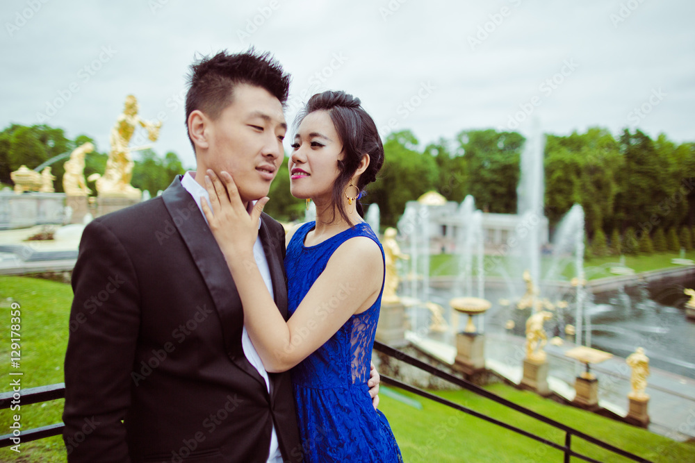 Fototapeta premium Wedding couple on the background of the fountain