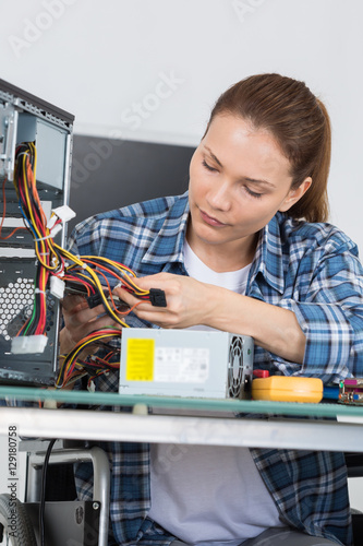 Wallpaper Mural student girl in technology fixing computer hard drive Torontodigital.ca