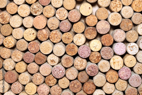 many different wine corks in the background