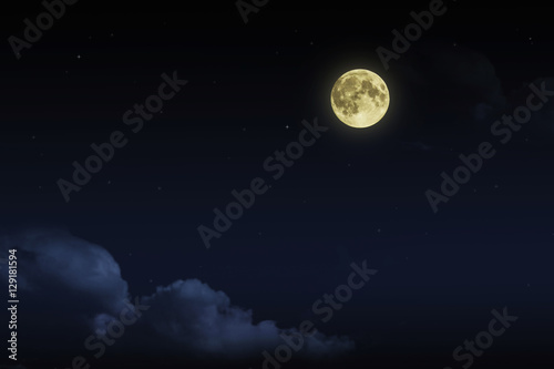 Beautiful magic blue night sky with clouds and fullmoon  stars