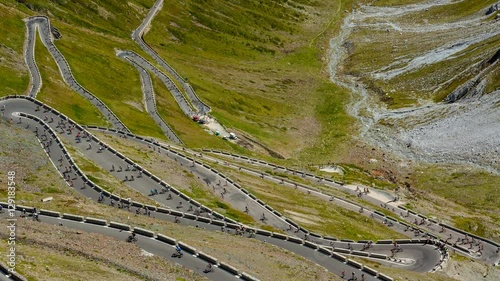 Timelapse video of summer evening in Stelvio Pass in the Alps, popular tourist destination photo