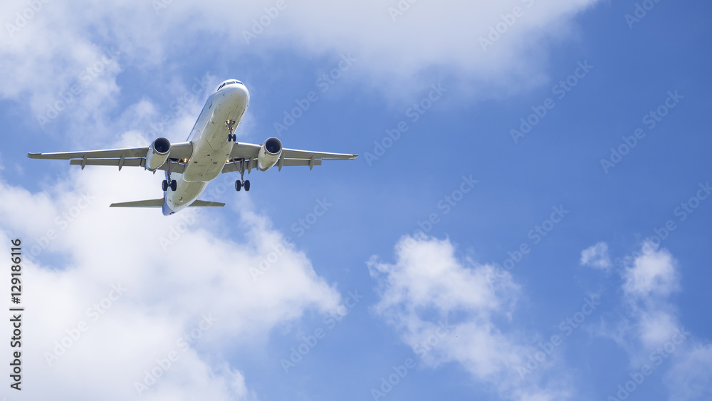 Airplane flying under blue sky 8