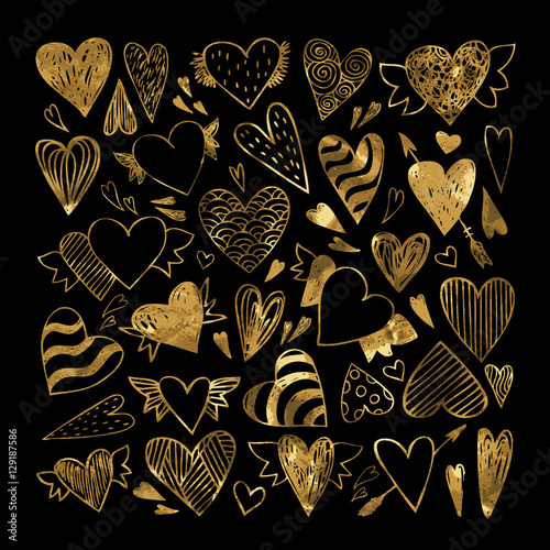 Hand drawn set gold tribal hearts