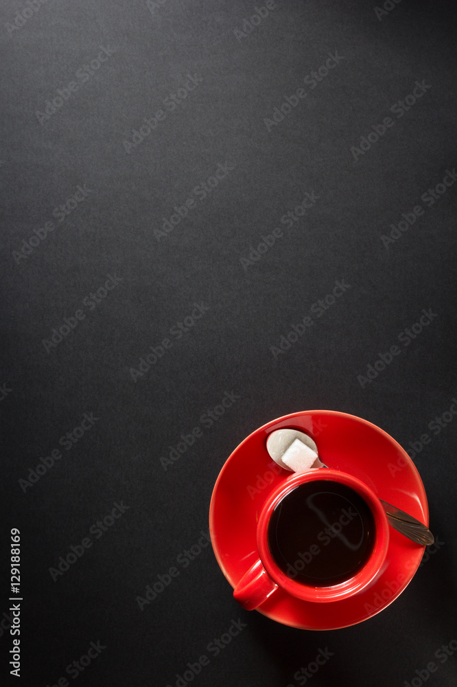 cup of coffee at black background