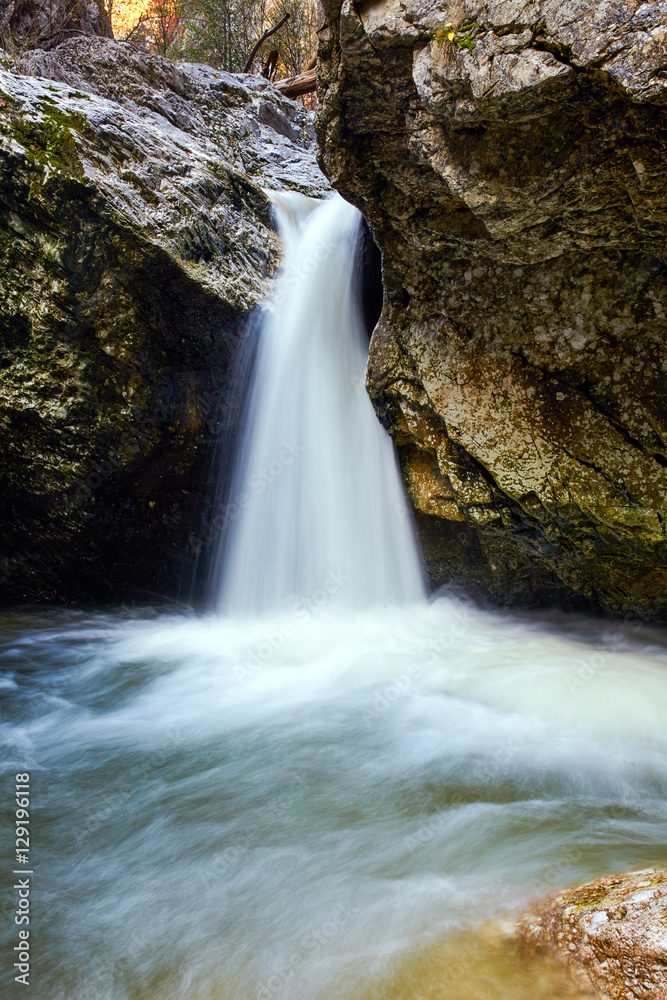 Obraz premium Beautiful mountain waterfall