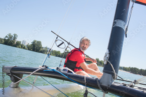 enjoying extreme sailing with racing sailboat