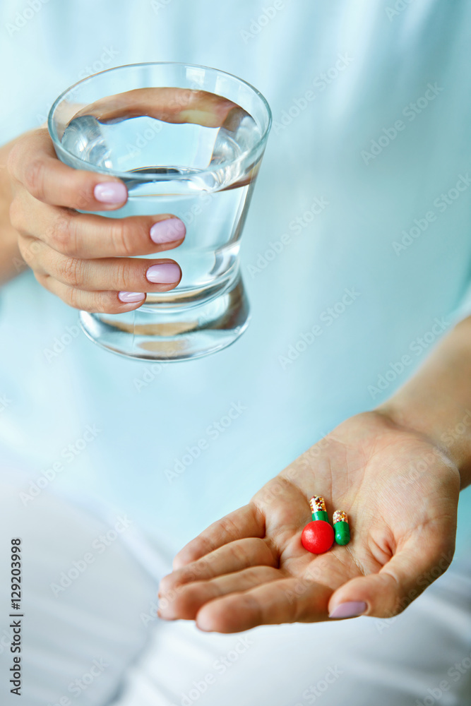 Vitamin And Supplement. Close Up Of Woman Hand Holding Pills Vitamin And Supplement. Close Up Of Woman Hand Holding Pills