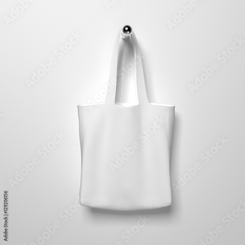 White cotton textile bag hanging right side. Highly detailed texture, space for business message. 3D rendering