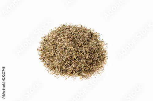 dry chopped herbs of thyme on a white background