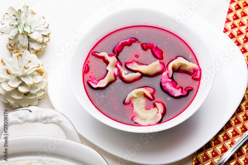 Red borsch with dumplings, traditional Polish Christmas Eve dish photo