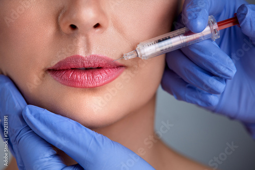 Close up of lips injection