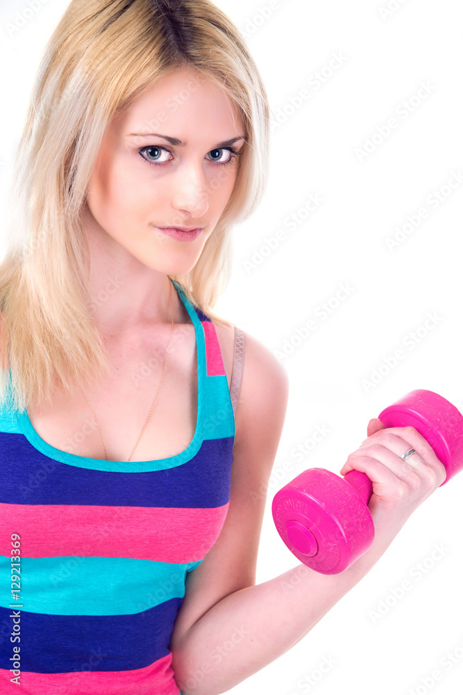 Young blonde with dumbbells isolated on white Young blonde with dumbbells isolated on white