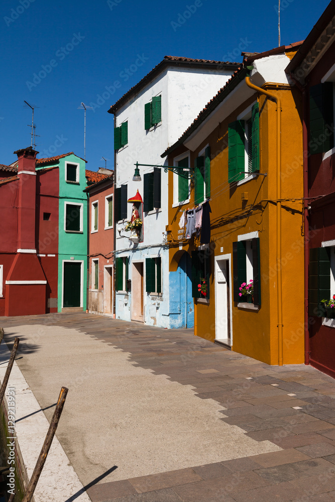 Colourfully painted houses on Burano, Venice, Italy.