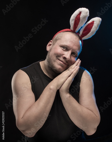 Comic actor with bunny ears, on the eve of Christmas and New Year