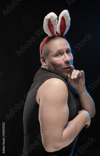 Comic actor with bunny ears, on the eve of Christmas and New Year photo