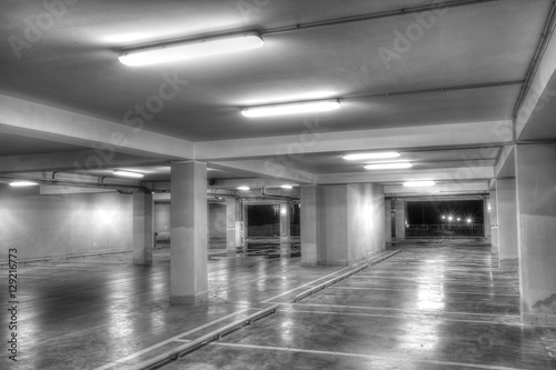 Empty underground parking garage  black and white 