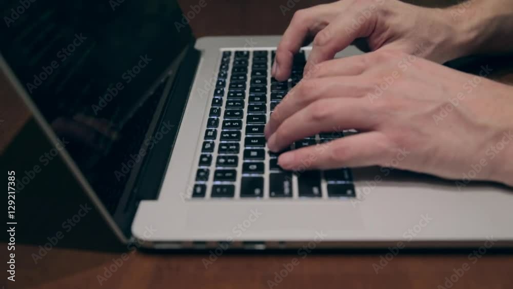 Man typing and take hands away after finished. Man typing and take hands away after finished.