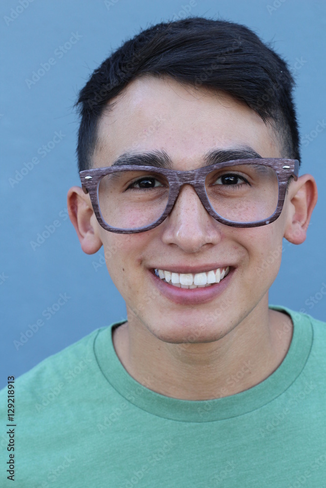 Portrait of a laughing hispanic guy with glasses - Stock image Portrait of a laughing hispanic guy with glasses - Stock image