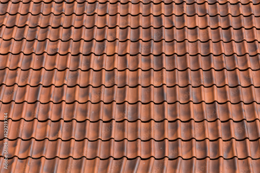 Red tiles roof background