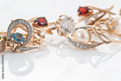 Gold rings, earrings with Topaz and pearls