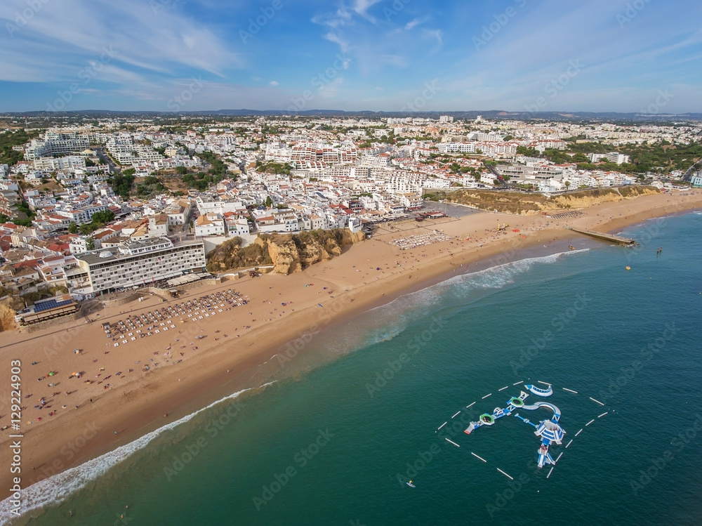 Aerial. Beach in Albufeira, water attractions in the summer.