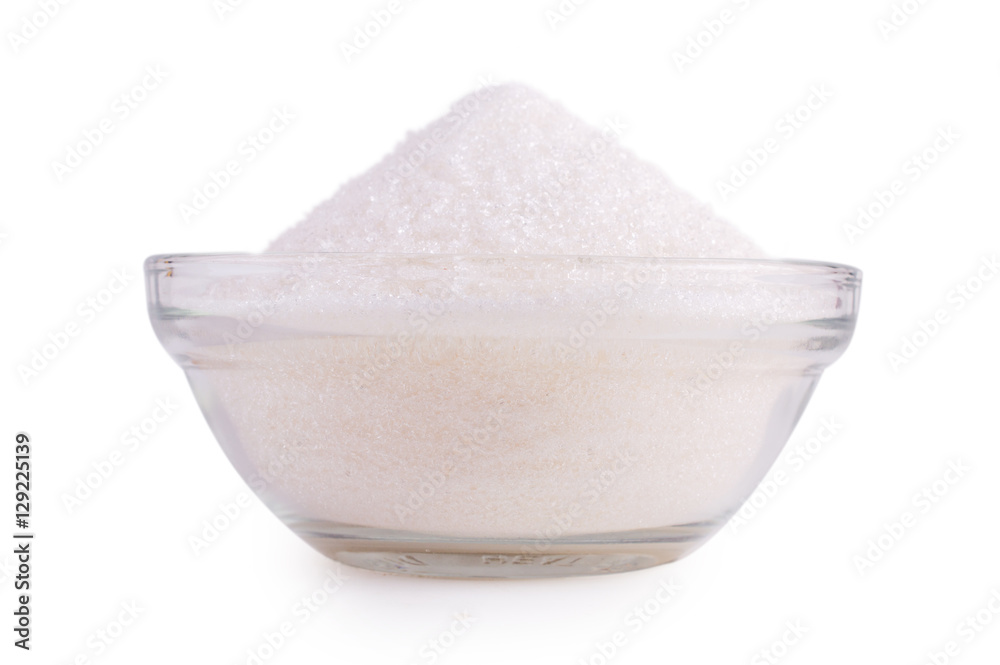 Sugar in glass bowl isolated on white Sugar in glass bowl isolated on white