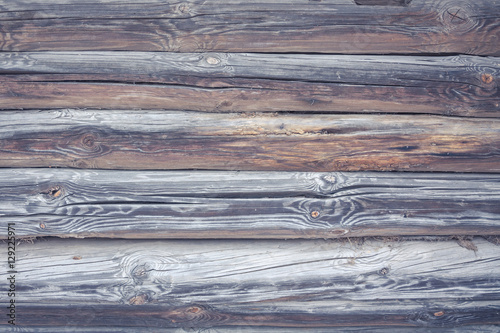 Rustic cabin wood wall background in vintage style with blue tint