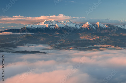 Beautiful autumn panorama from Pieniny over Spisz highland to snowy Tatra mountains in the morning, Poland