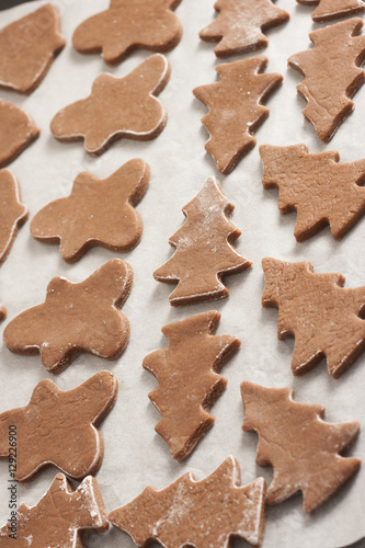 christmas gingerbread cookies baking process , dough and rolling pin,shallow depth of field.