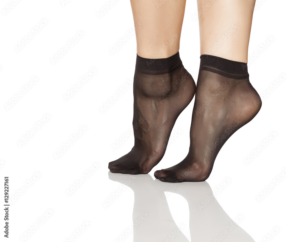 female feet in short nylon socks Stock Photo | Adobe Stock