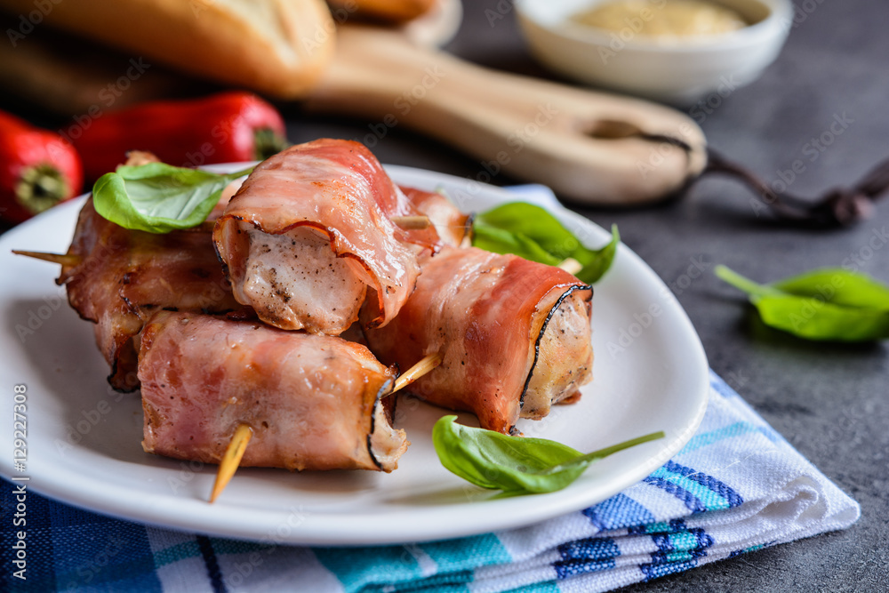 Roasted tuna meat pieces wrapped in bacon slices