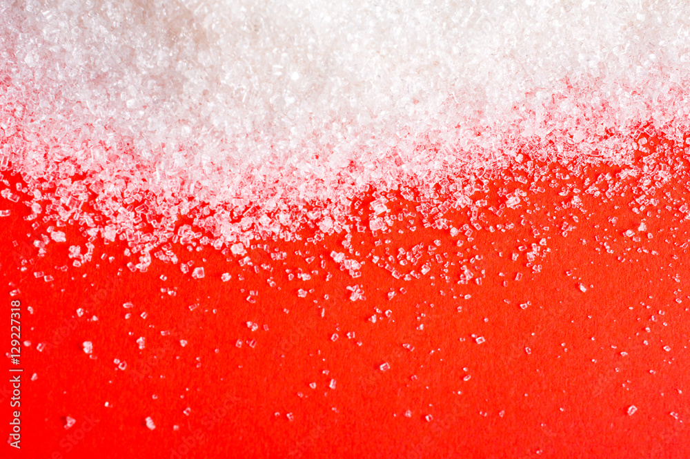 sugar on a red background sugar on a red background