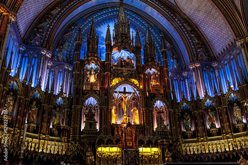 Fotografie, Tablou Spectacularly illuminated altar in enormous basilica